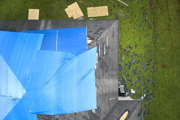 Damaged Roof with Tarp